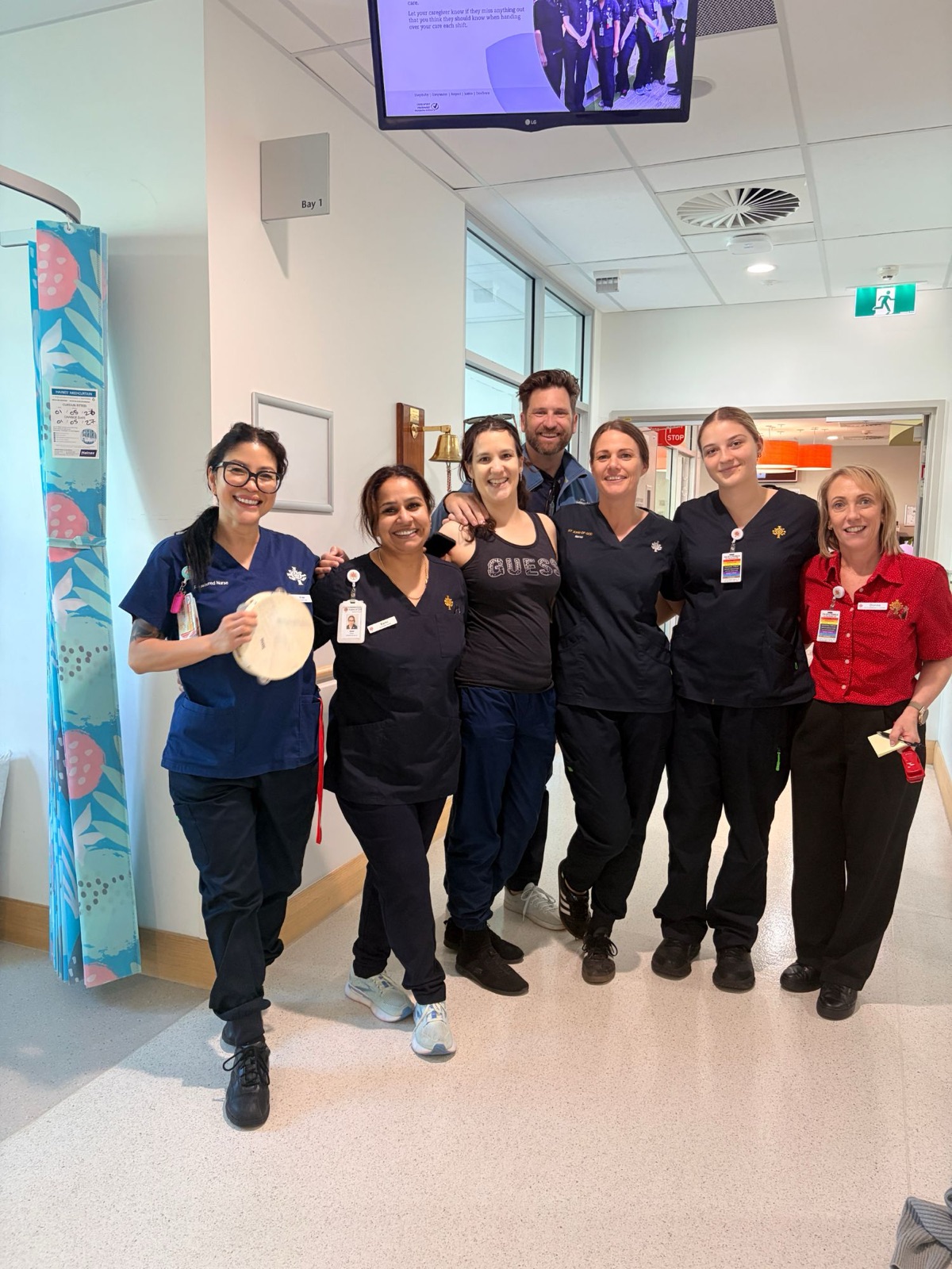 Kat with the oncology nurses after her last chemo